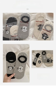 Close-up of cute cartoon animal patterned low cut invisible socks with non-slip silicone