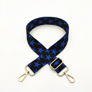Adjustable black crossbody strap with blue star embroidery and gold metal clips