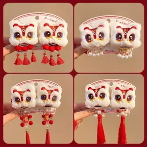 Traditional Chinese New Year lion dance hair clips with plush fur and festive tassels