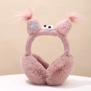 Detail of pink plush earmuffs with funny big eyes and colorful star braid decorations