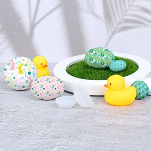 DIY Easter egg mold kit with decorative plastic eggs featuring floral and bunny patterns