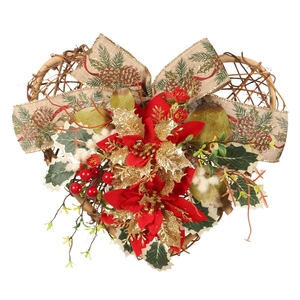 Christmas heart-shaped wreath with red flowers and golden leaves for front door decor