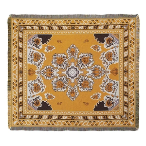 Mustard yellow bohemian woven camping blanket with retro ethnic floral patterns and tassels
