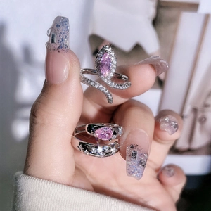 Chic silver-plated snake ring and heart star band featuring sparkling pink zircon gemstones
