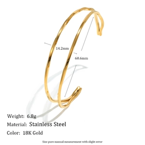 Detail view of 18K gold plated stainless steel twisted bangle with size specifications