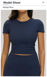 Front view of badge blue slim fit yoga crop top and matching high waist leggings