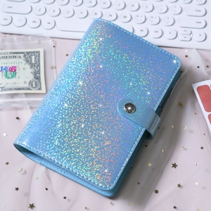 Close-up of blue glitter PU leather A6 binder cover with snap button and shiny texture