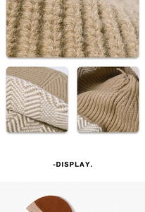 Close-up of winter knit beanie showing beige and maroon zigzag stitch textures