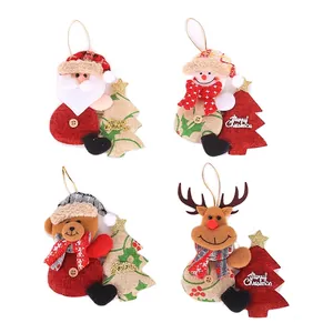 Set of 4 Christmas fabric ornaments featuring Santa, Snowman, Bear, and Reindeer dolls