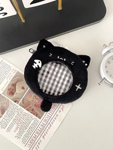 Detail view of black plush cat anime badge holder with clear window and keyhook