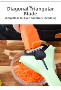 Detail of sharp stainless steel triangular blade shredding carrots on a wooden board