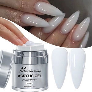 Detailed view of white acrylic nail extension gel with applied long stiletto manicure effect