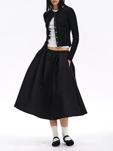 American style two-piece set featuring black cardigan and high-waist pleated midi skirt