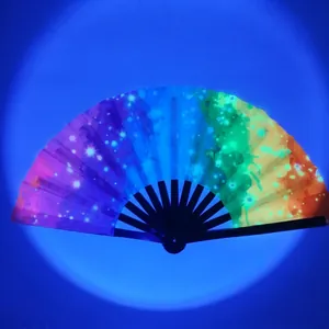 Vibrant rainbow fluorescent folding fan with black bamboo ribs for party and stage performance