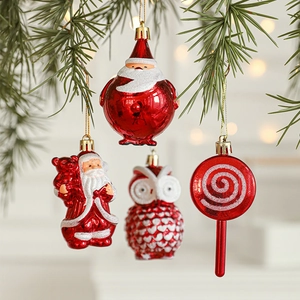 Set of four red electroplated Christmas ornaments featuring Santa and owl on pine branch