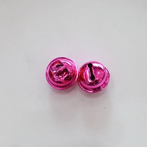 Detail of rose pink metallic craft bells with high gloss vacuum plating finish
