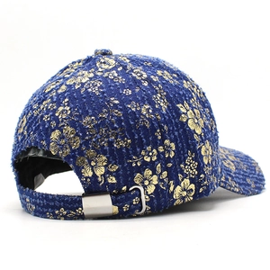 Navy blue tweed baseball cap with gold flower embroidery and adjustable metal buckle