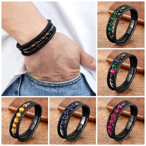 Detail view of multilayer braided leather bracelets with colorful stone beads and magnetic clasp