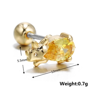 Macro detail of golden rhino stud earring with yellow zircon and screw back closure