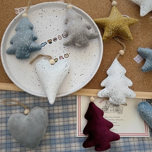 Detailed plush Christmas ornaments including tree, heart, and star with wooden beads