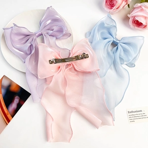 Elegant mermaid blue, purple, and pink organza bow hair clips with spring metal clasps