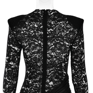 Detail of black lace dress back with shoulder pads, pleated waist and zipper closure