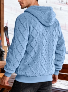 Rear view of men blue jacquard fleece hoodie showing unique diamond knit texture in snow