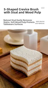 Close-up of S-shaped sisal and wood pulp sponge on wooden tray for kitchen cleaning