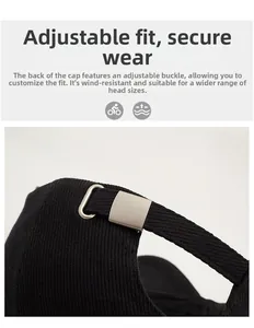 Macro view of adjustable metal buckle and knitted texture on black baseball cap