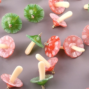 Colorful acrylic mushroom pendants in green, pink and beige for DIY jewelry making