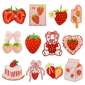 Set of 12 strawberry-themed embroidered patches including bears and milk cartons for clothes