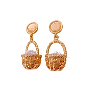 Elegant gold basket earrings with white pearls and vintage woven texture style