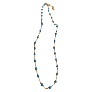 Bohemian gold-plated necklace featuring blue beads and elegant metallic links