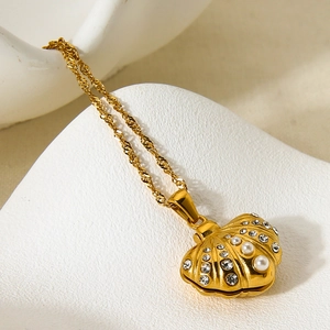 18K gold plated shell locket necklace with zircon and pearls on twisted rope chain