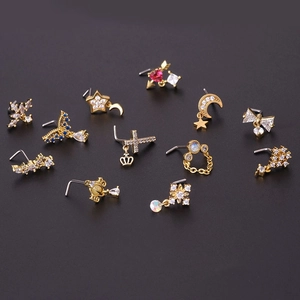 Set of 12 golden 20G surgical steel nose studs with zirconia and opal in various shapes