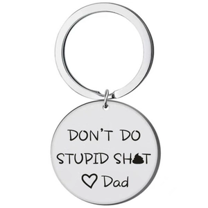 Detail of silver round pendant keychain with 'DON'T DO STUPID SH T' engraving from Dad