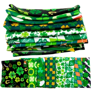 Detailed fabric patterns for St. Patrick's Day pet bandanas with shamrock and clover prints