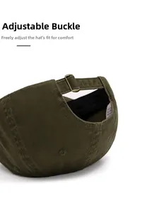 Close-up of olive green cotton baseball cap with adjustable antique brass buckle strap