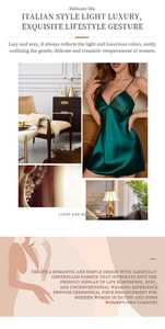 Detail of emerald green silk slip dress featuring delicate straps and deep V-neckline