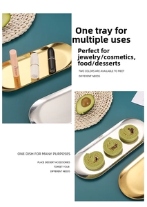 Close-up of polished gold and silver oval stainless steel trays for jewelry storage