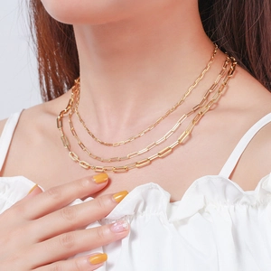Three-layer gold paperclip chain necklace for women in a layered minimalist style