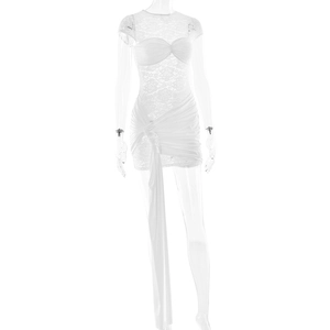 Detail of white lace bodice and ruched skirt with side tie ribbons on the dress
