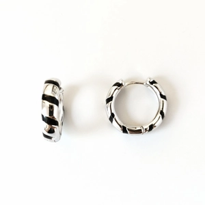 Minimalist S925 silver hoop earrings featuring modern black enamel diagonal stripes
