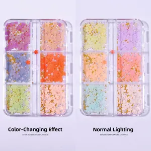 Nail art set showing color-changing camellia charms in containers before and after UV light