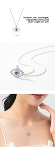 Macro shot of S925 sterling silver evil eye pendant with blue turquoise and zircons