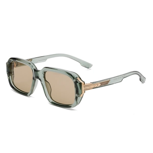 Classic pilot square sunglasses with transparent green frames and brown lenses at 45-degree angle