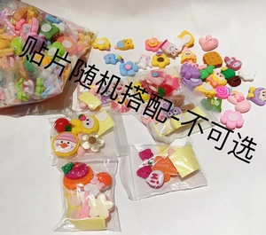 Macro shot of colorful DIY resin charms featuring cartoon strawberry, rabbit and donut shapes