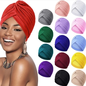 Elastic pleated turban hat for women in 15 colors shown on model and color palette