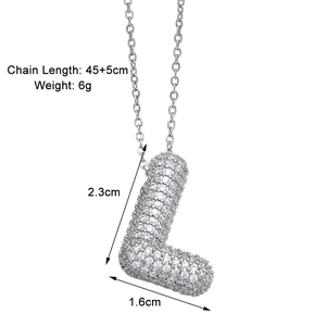 Detailed view of silver letter L pendant with cubic zirconia inlay and measurements