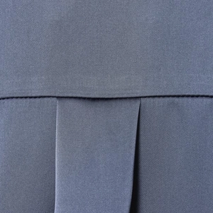 Women's satin blouse in deep blue featuring premium diagonal weave and pleated back detail